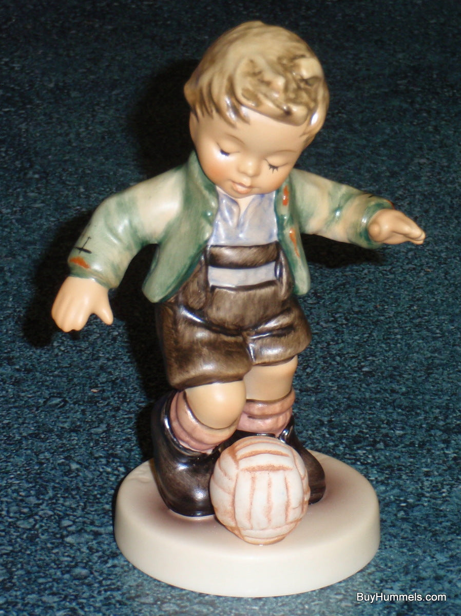"Fancy Footwork" Goebel Hummel Figurine #2211 - Boy Playing Soccer!