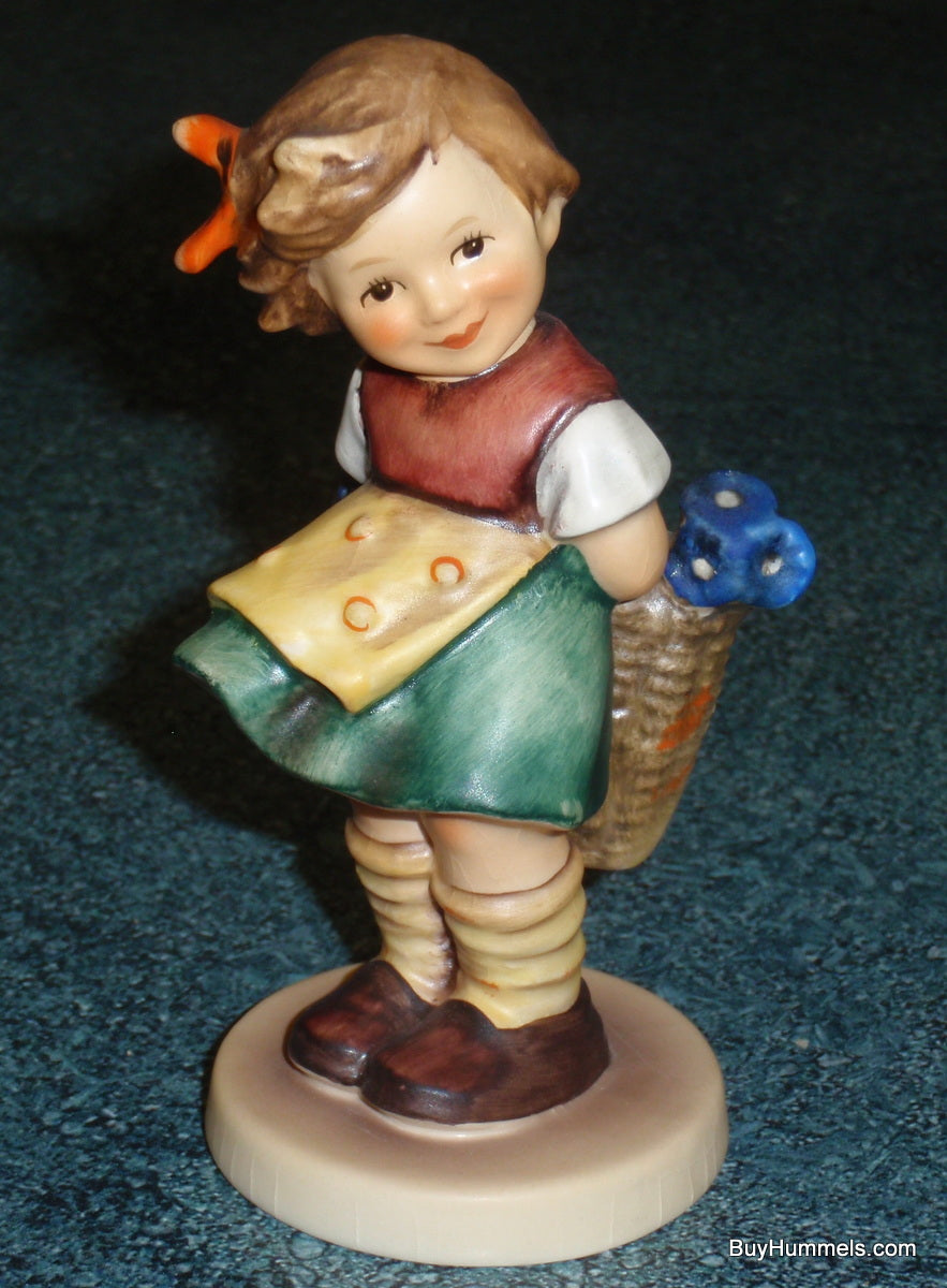 "Bashful" Goebel Hummel Figurine #377 - Girl With Basket Of Flowers