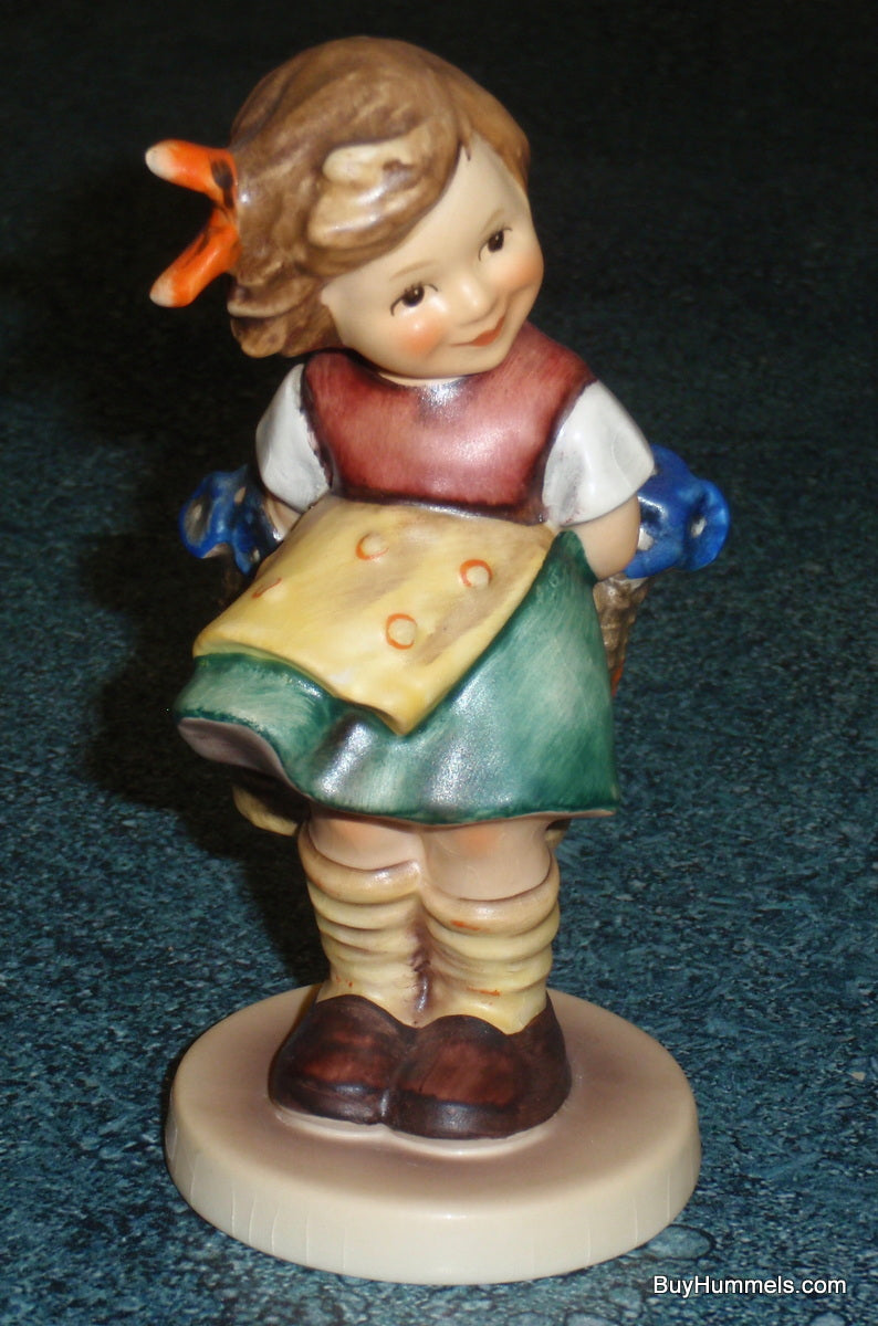 "Bashful" Goebel Hummel Figurine #377 - Girl With Basket Of Flowers