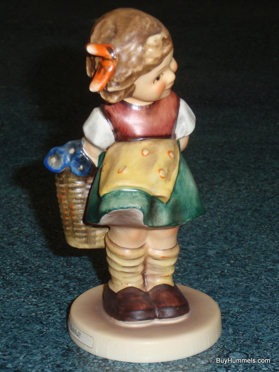 "Bashful" Goebel Hummel Figurine #377 - Girl With Basket Of Flowers