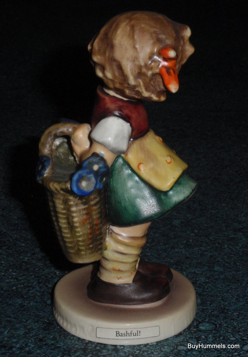 "Bashful" Goebel Hummel Figurine #377 - Girl With Basket Of Flowers