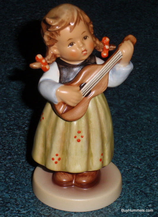 "Strum Along" Goebel Hummel Figurine #557 TMK7 Girl Playing Guitar