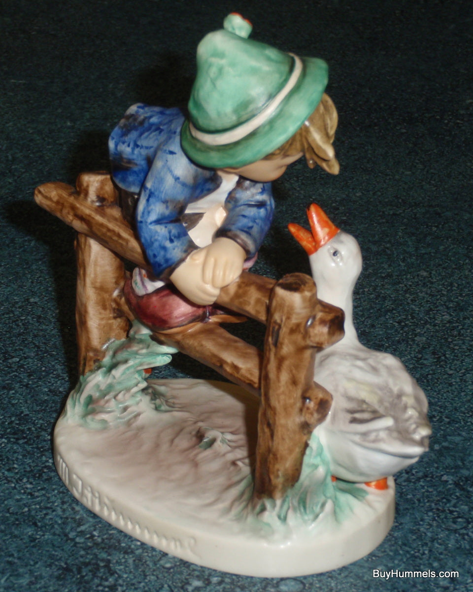 "Barnyard Hero" Goebel Hummel Figurine #195/I - Boy On Fence With Duck!