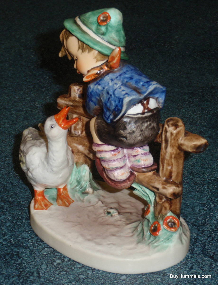 "Barnyard Hero" Goebel Hummel Figurine #195/I - Boy On Fence With Duck!