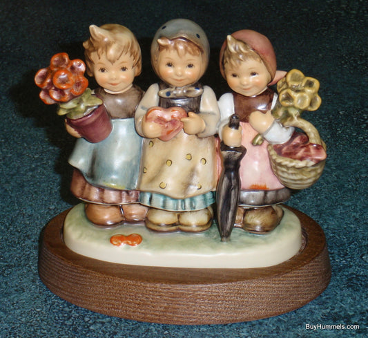 Goebel Hummel Trio of Wishes #721 - Limited Edition - Three Girls with Heart and Flower Pot - Helmut Fischer Master Sculptor - Mint TMK7 with Wooden Stand