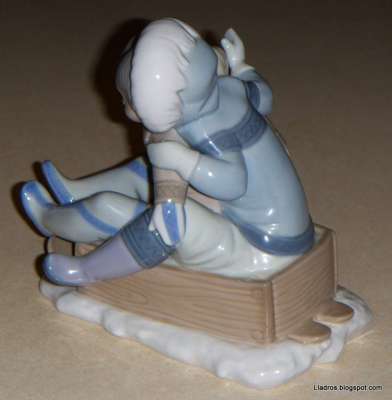 "Hang On" Lladro Figurine #5665 - Eskimo Children Sledding (5.75")