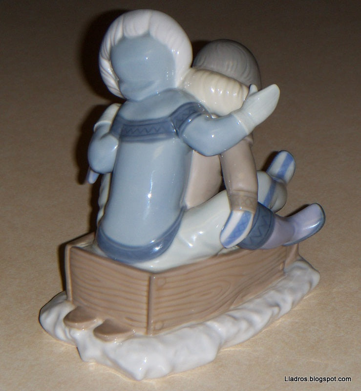"Hang On" Lladro Figurine #5665 - Eskimo Children Sledding (5.75")