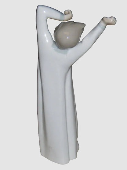 "Boy Awakening" Lladro Figurine #4870 (8.25" Glossy Finish)