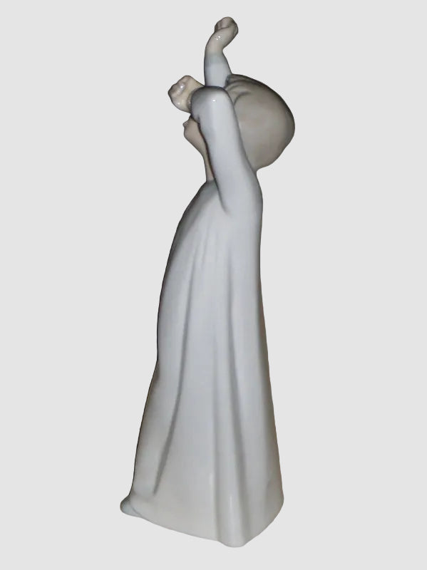 "Boy Awakening" Lladro Figurine #4870 (8.25" Glossy Finish)