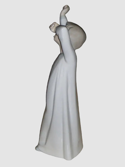 "Boy Awakening" Lladro Figurine #4870 (8.25" Glossy Finish)