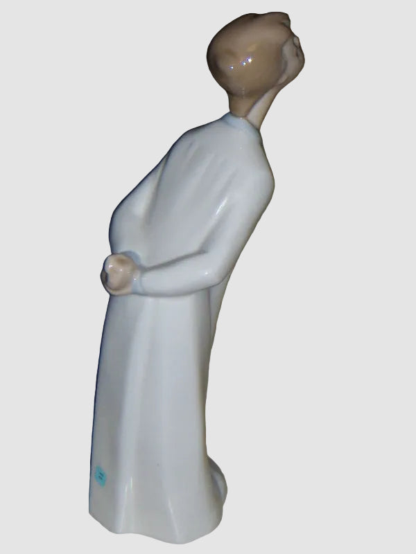 "Boy Blowing Goodnight Kiss" Lladro Figurine #4869 (8")