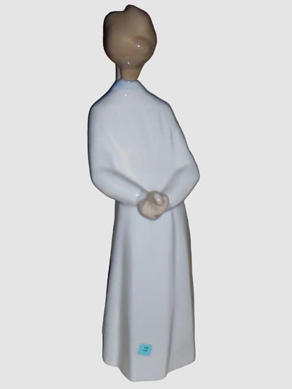 "Boy Blowing Goodnight Kiss" Lladro Figurine #4869 (8")