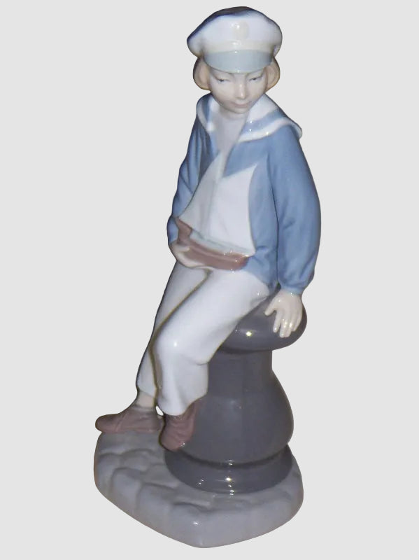 "Young Sailor" Lladro Daisa Figurine #4810 - Boy With Sailboat (9")