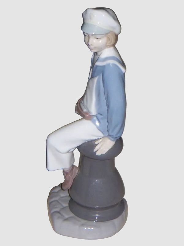 "Young Sailor" Lladro Daisa Figurine #4810 - Boy With Sailboat (9")