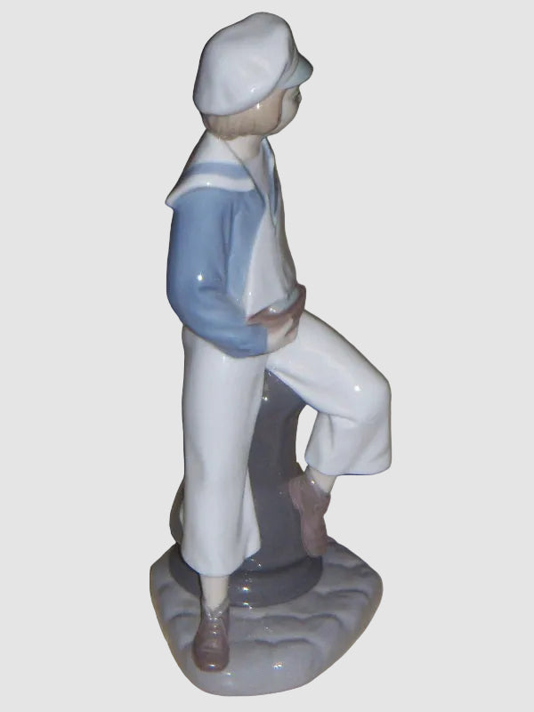 "Young Sailor" Lladro Daisa Figurine #4810 - Boy With Sailboat (9")