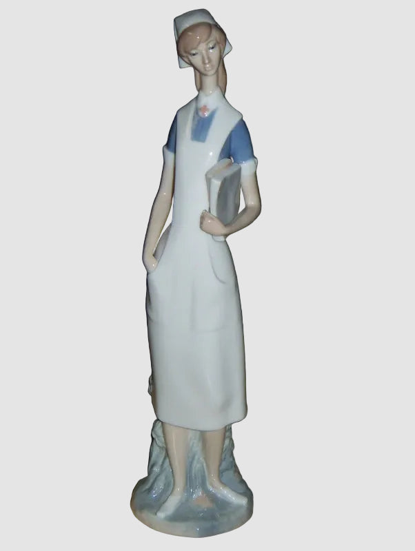 Lladro Nurse Figurine 4603 Enfermera Salvador Furio Nursing Student Medical Professional Books Vintage Spain Porcelain Glossy Finish