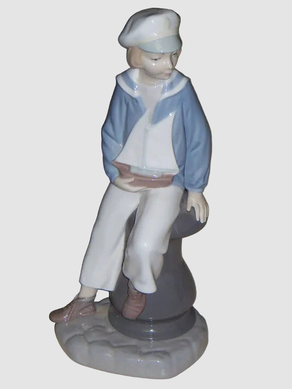 "Young Sailor" Lladro Daisa Figurine #4810 - Boy With Sailboat (9")