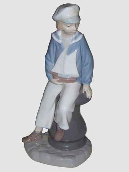 "Young Sailor" Lladro Daisa Figurine #4810 - Boy With Sailboat (9")