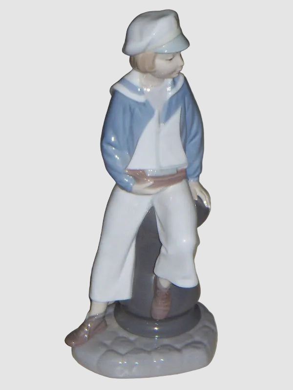"Young Sailor" Lladro Daisa Figurine #4810 - Boy With Sailboat (9")