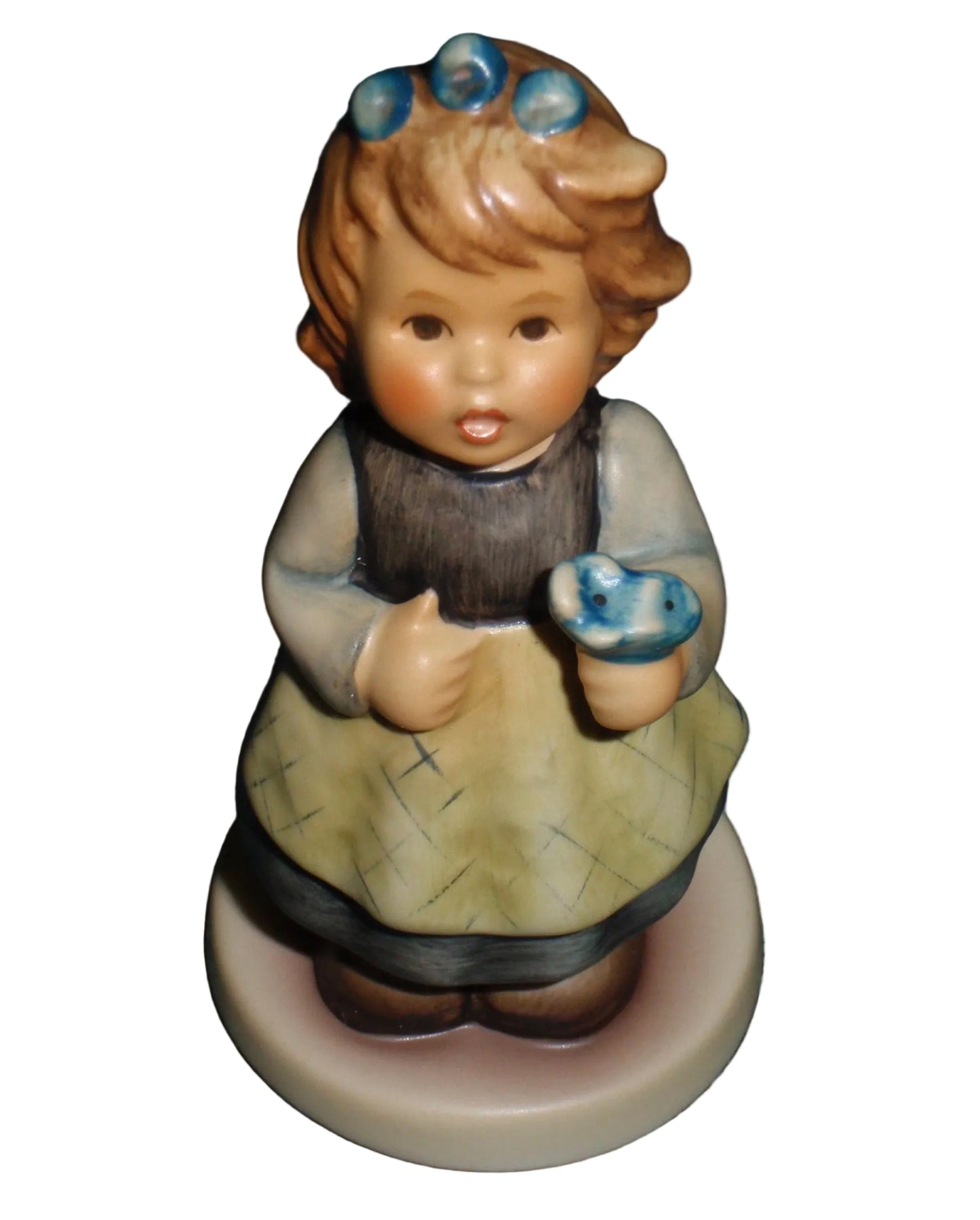 Goebel Hummel From The Heart 761 Girl in White Dress and Yellow Apron Holding Blue Flower Figurine Helmut Fischer