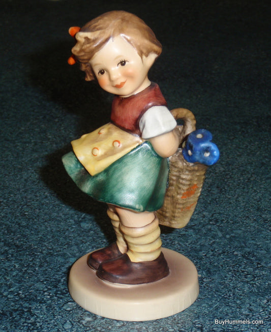 "Bashful" Goebel Hummel Figurine #377 - Girl With Basket Of Flowers
