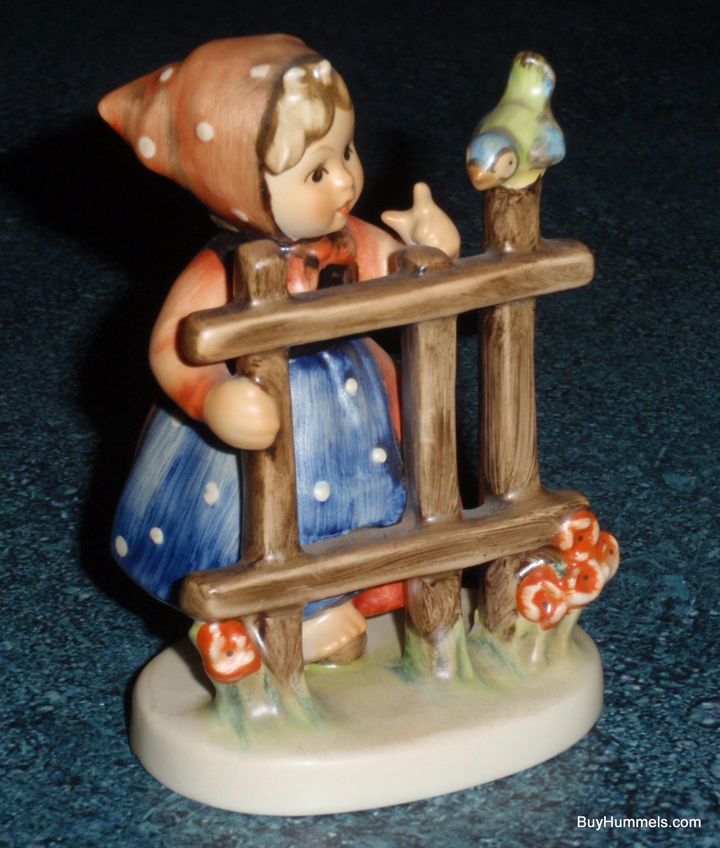 Goebel Hummel Signs of Spring #203 2/0 - Girl with Bird and Fence - Arthur Moeller Master Sculptor - 3.75 Inch German Figurine