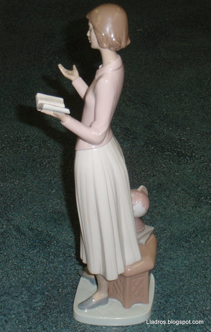 "Today's Lesson" Lladro Porcelain Figurine #6659 - Teacher with Globe