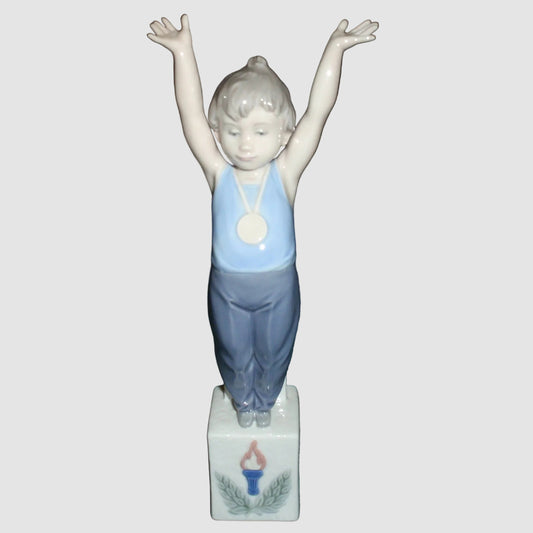 Lladro Olympic Champion Figurine 5871 Boy on Podium with Medal Joan Coderch Vintage Spain Porcelain Victory