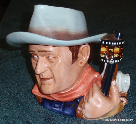 Royal Doulton John Wayne Character Jug D7269 - 2007 Jug of the Year - Film Reel and Winchester Rifle Handle - Pioneer Wagon Detail - Limited Edition Year Issue