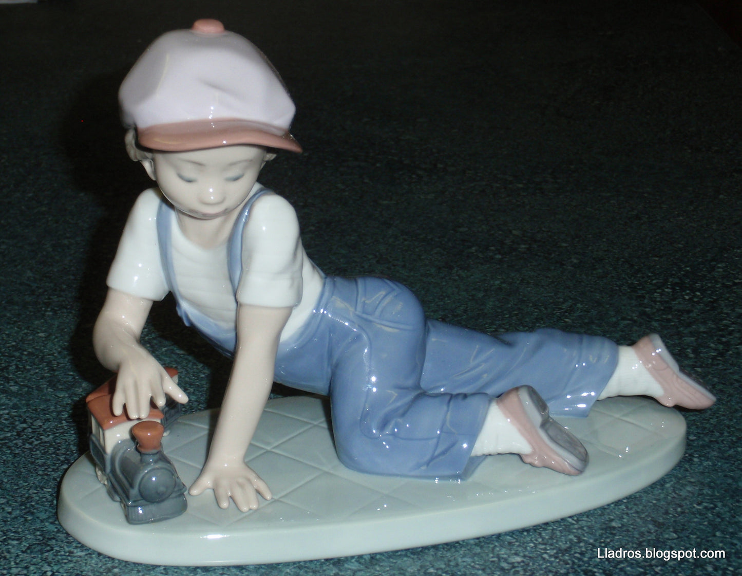 "All Aboard" Lladro Little Boy With Train Figurine #7619