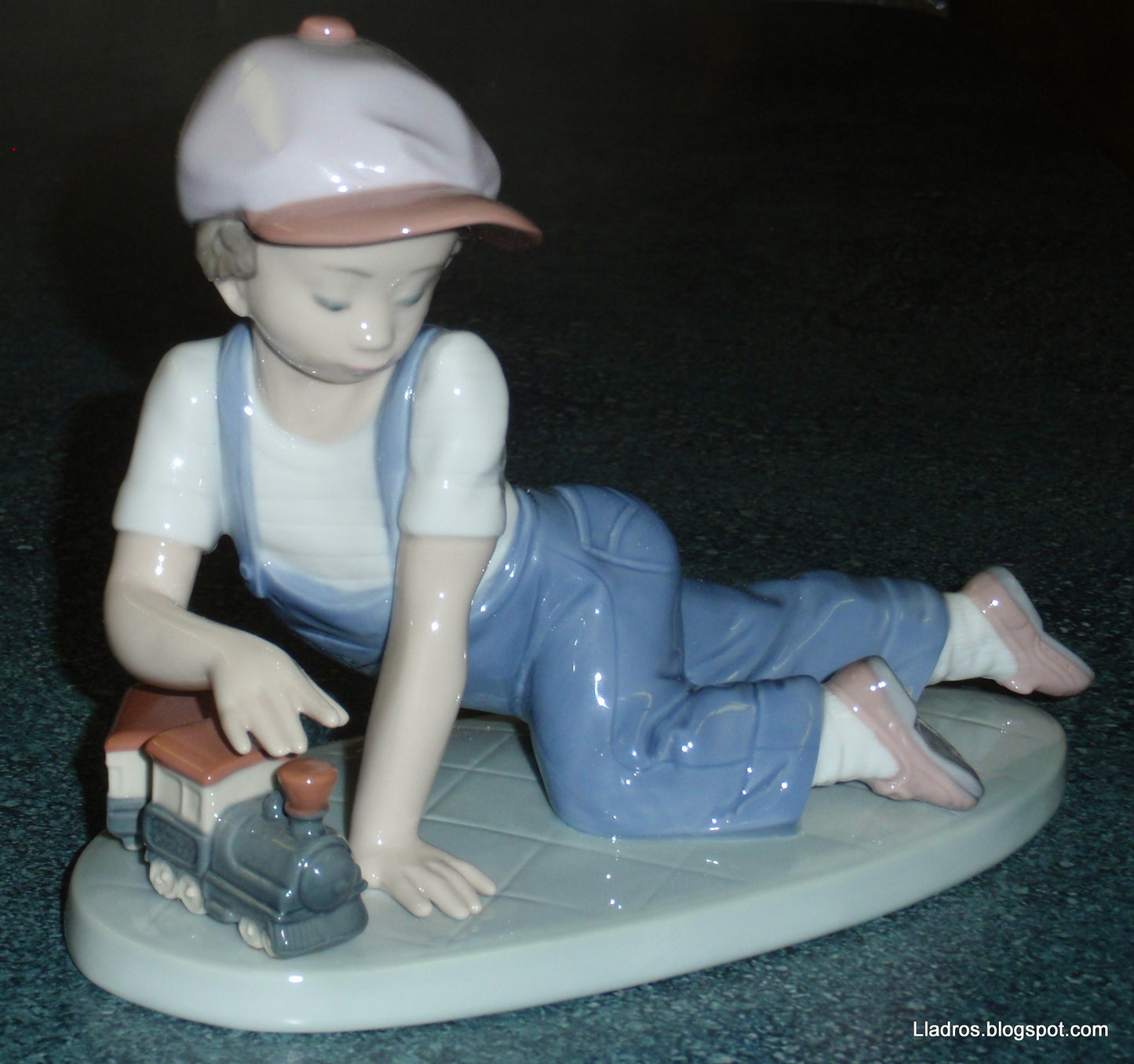 "All Aboard" Lladro Little Boy With Train Figurine #7619