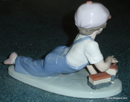 "All Aboard" Lladro Little Boy With Train Figurine #7619