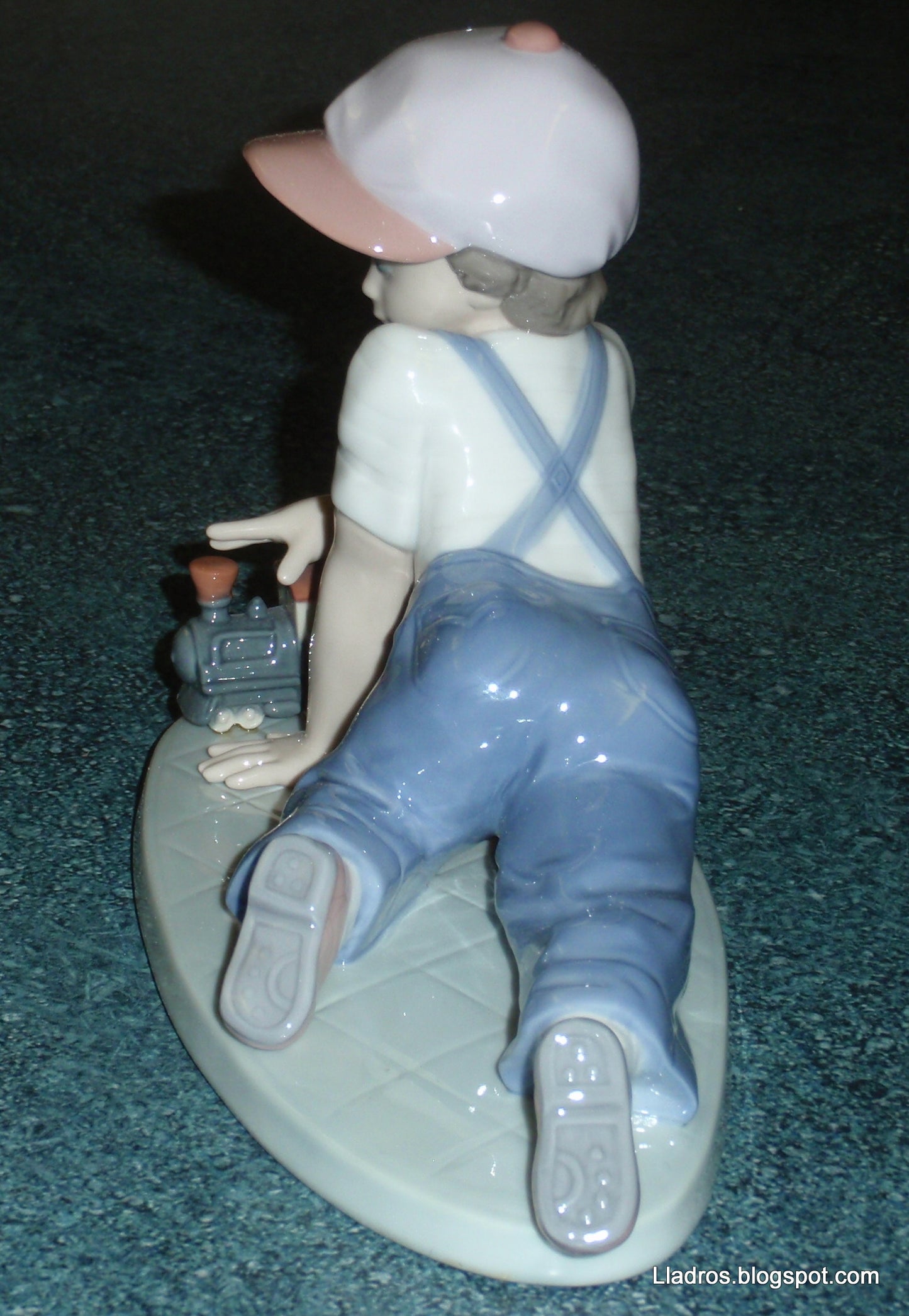 "All Aboard" Lladro Little Boy With Train Figurine #7619