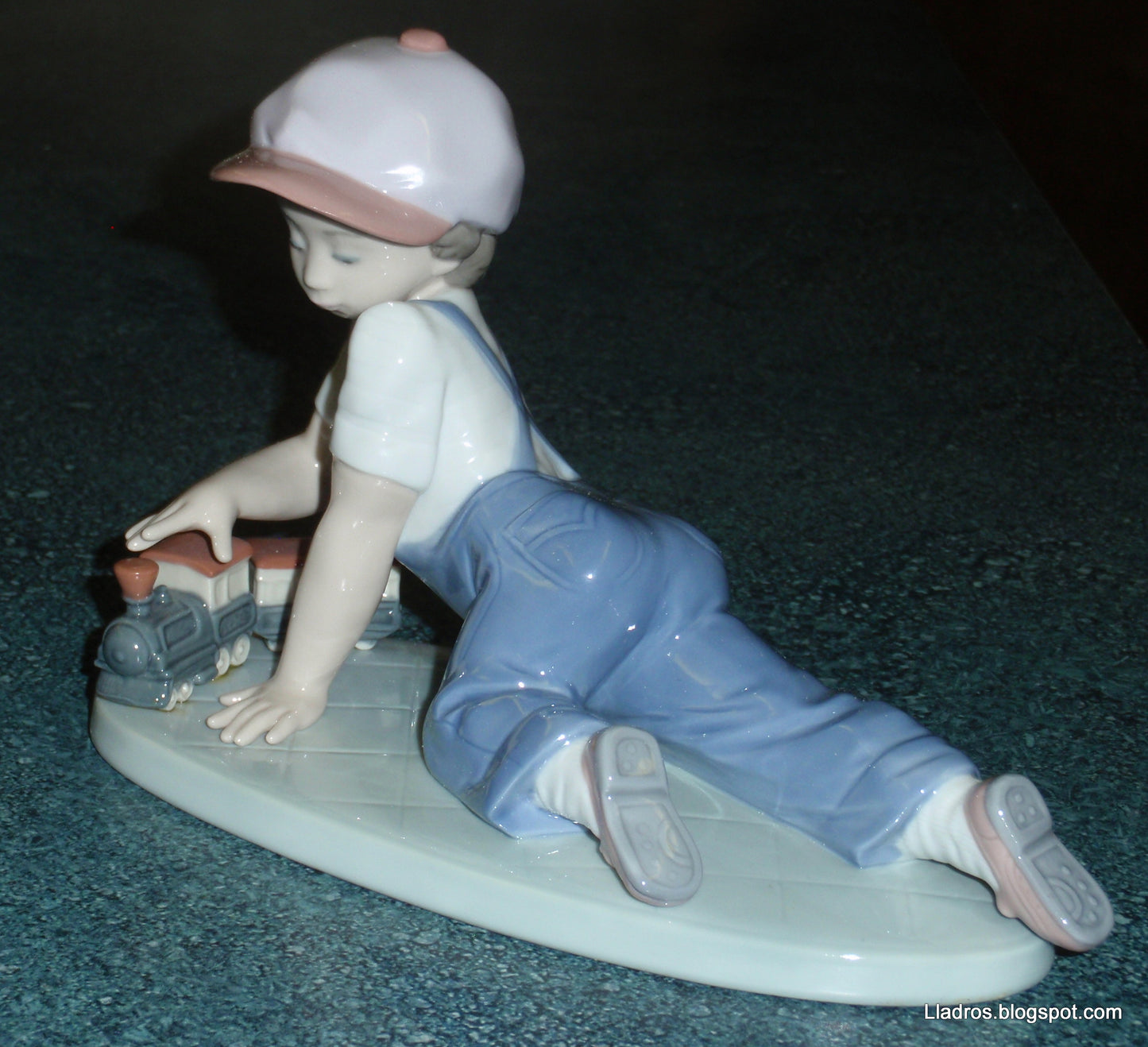 "All Aboard" Lladro Little Boy With Train Figurine #7619