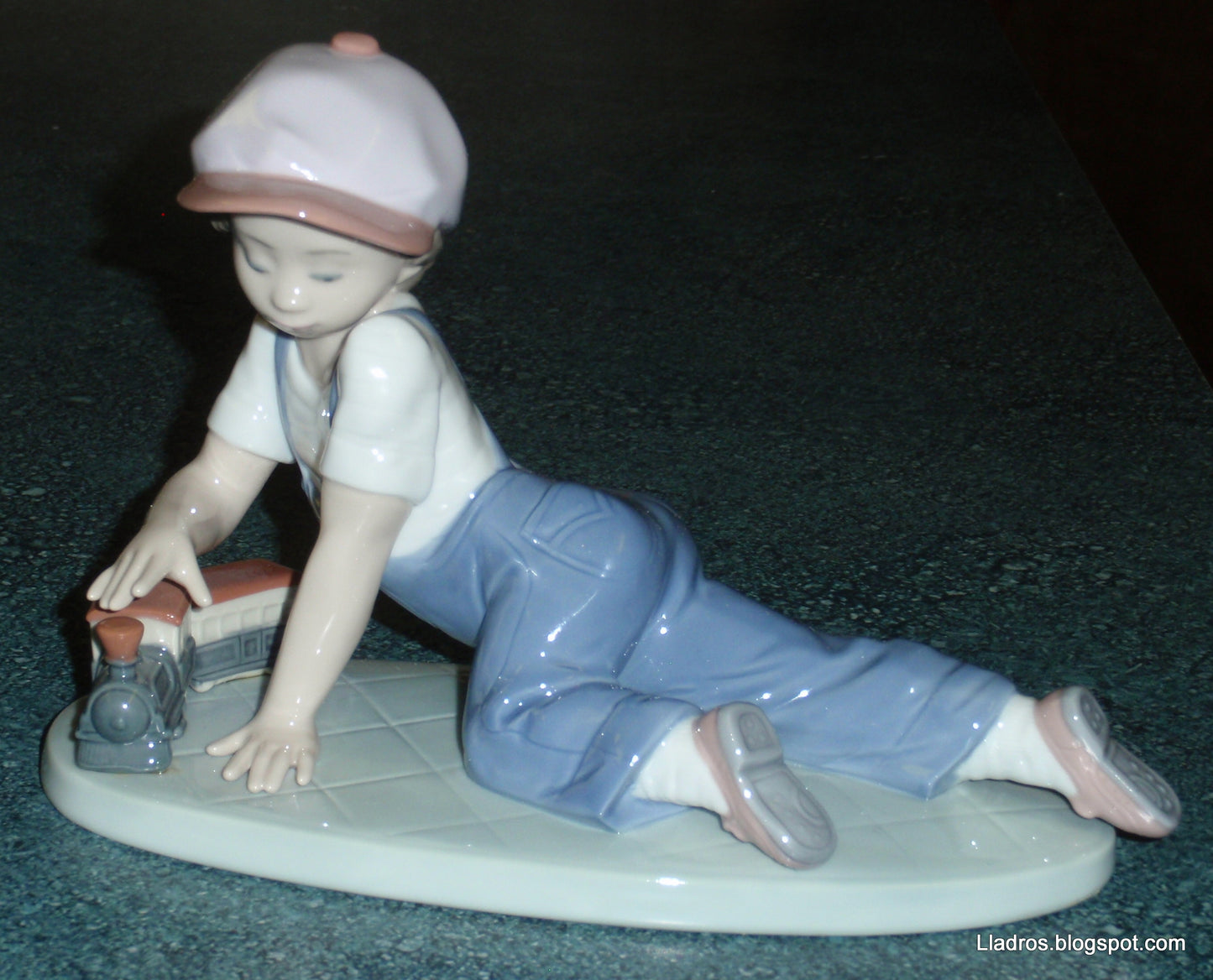 "All Aboard" Lladro Little Boy With Train Figurine #7619