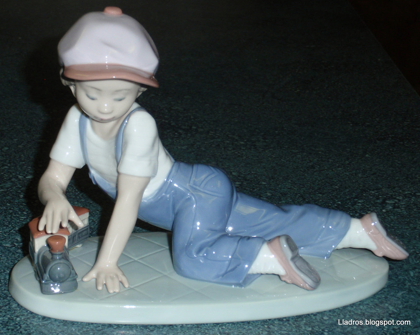 "All Aboard" Lladro Little Boy With Train Figurine #7619