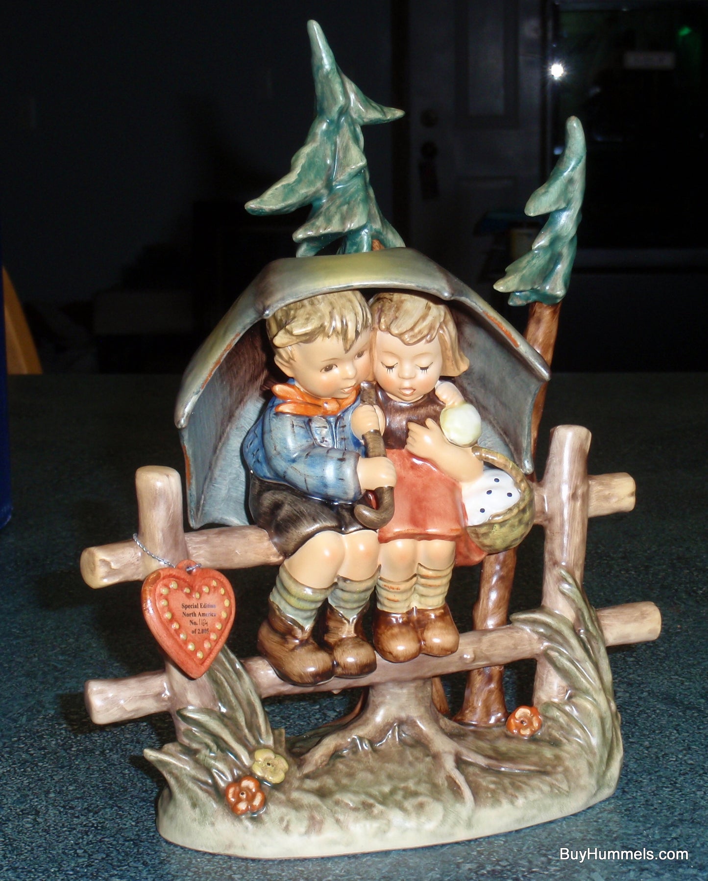 "April Shower" Goebel Hummel Figurine #610 Boy & Girl Under Umbrella