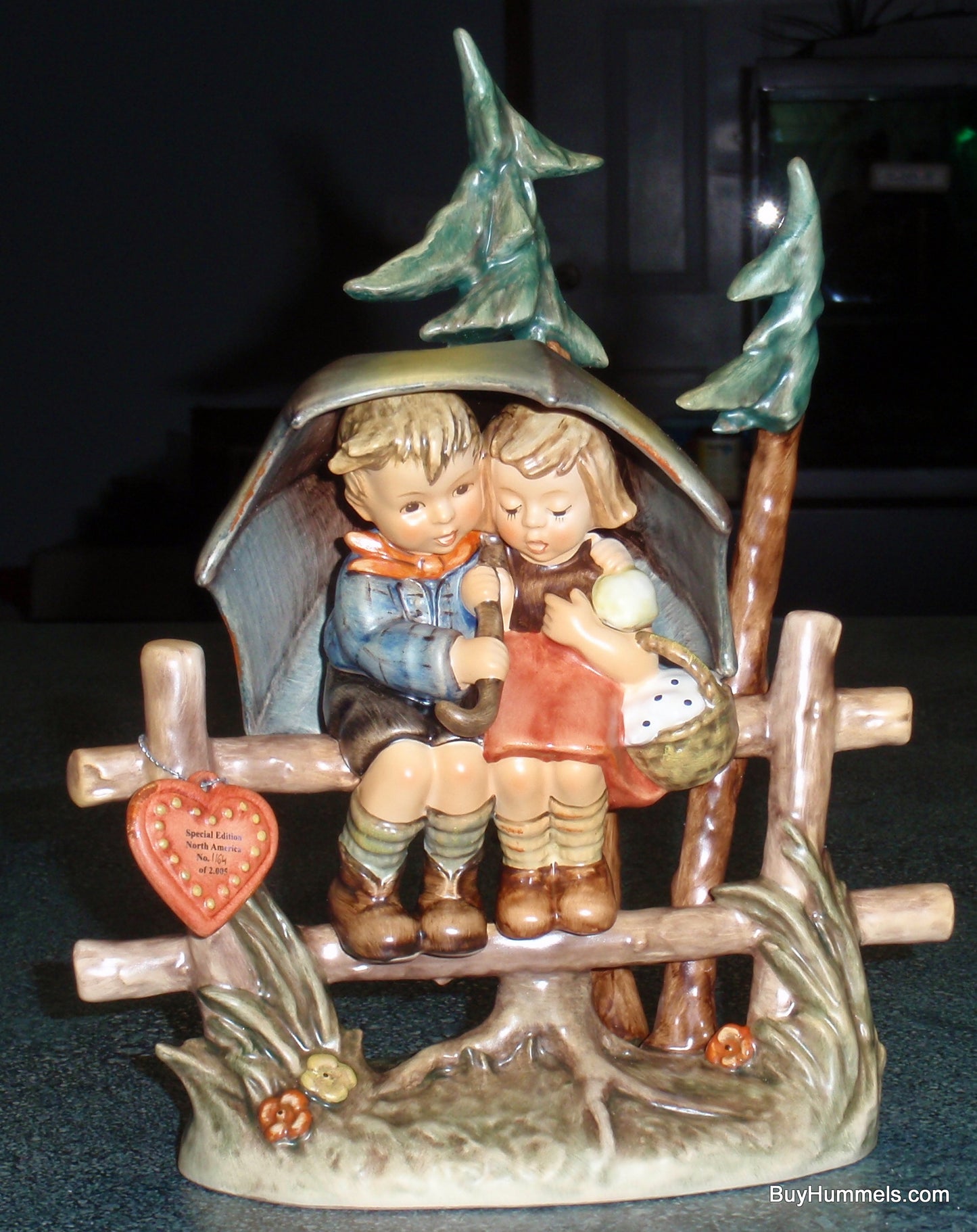 "April Shower" Goebel Hummel Figurine #610 Boy & Girl Under Umbrella