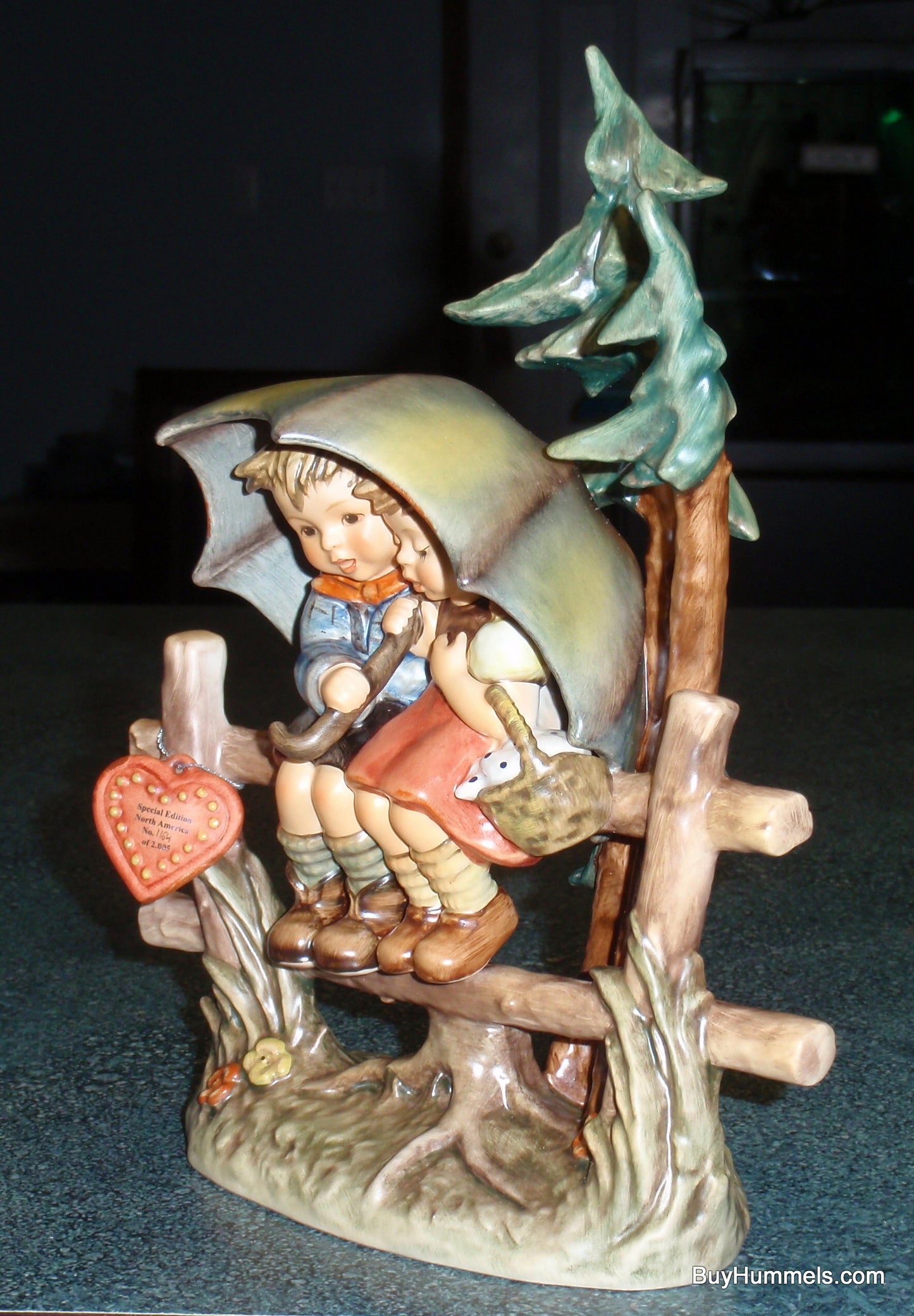 "April Shower" Goebel Hummel Figurine #610 Boy & Girl Under Umbrella