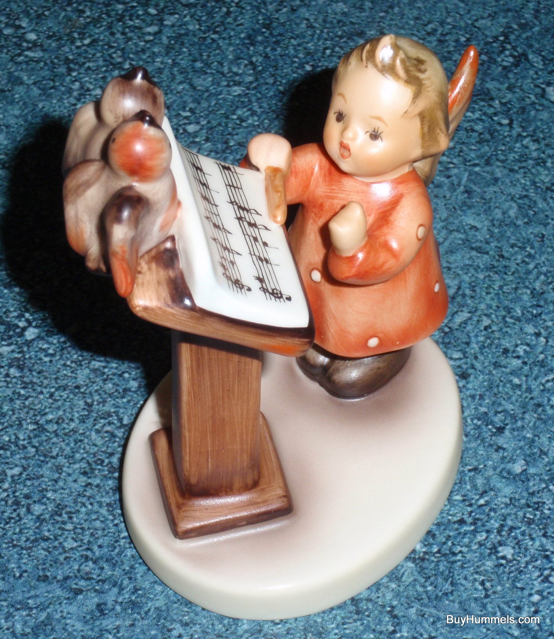 Hummel figurine girl standing with 2025 sheet music