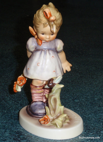 "Will It Sting?" Goebel Hummel Figurine #450 - Little Girl With Bumblebee