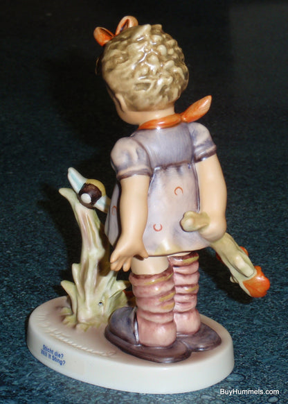 "Will It Sting?" Goebel Hummel Figurine #450 - Little Girl With Bumblebee