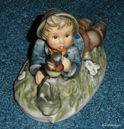 "Lazybones" Goebel Hummel Figurine #612/2/0 - Little Boy Laying In Meadow With Song Bird!