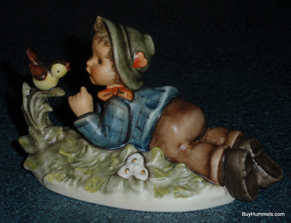 "Lazybones" Goebel Hummel Figurine #612/2/0 - Little Boy Laying In Meadow With Song Bird!