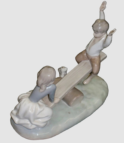 "See Saw" Lladro Figurine #4867 - Boy & Girl Teeter Totter (8")