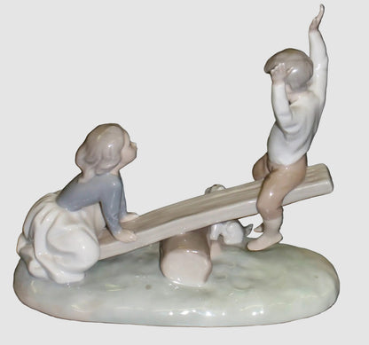 "See Saw" Lladro Figurine #4867 - Boy & Girl Teeter Totter (8")