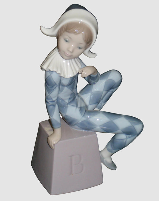 Lladro Harlequin B Figurine 5076 Boy in Blue Clown Suit Jester Sitting on Block Francisco Catala Vintage Spain Porcelain