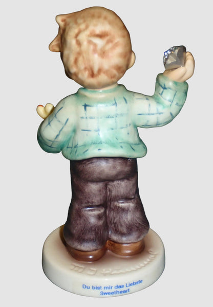 "Sweetheart" Goebel Hummel Figurine #2323 - Boy with Swarovski Crystal (4")