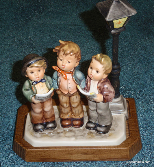 Goebel Hummel Tuneful Trio #757 - Limited Edition 25,000 - Three Boys Singing under Streetlamp - Helmut Fischer Master Sculptor - Mint TMK7 with Wooden Stand