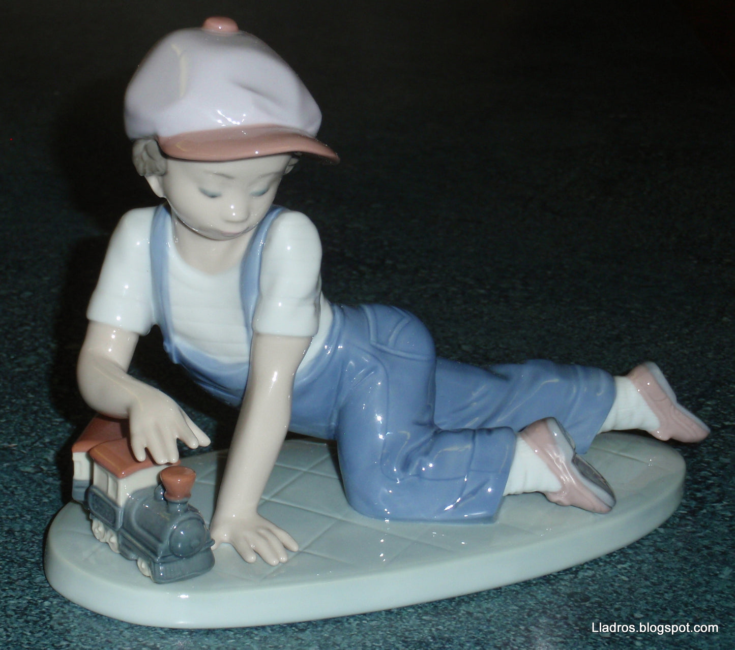 "All Aboard" Lladro Little Boy With Train Figurine #7619